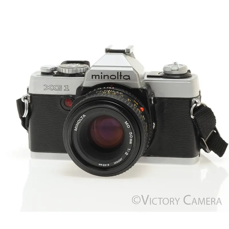 Minolta XG1 Chrome 35mm Camera w/ MD 50mm f1.7 Lens -New Seals- [EXC]