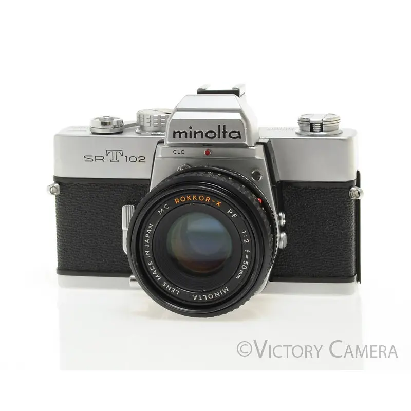 Minolta SRT 102 Chrome 35mm Camera w/ 50mm f2 Lens -New Seals-  [EXC]