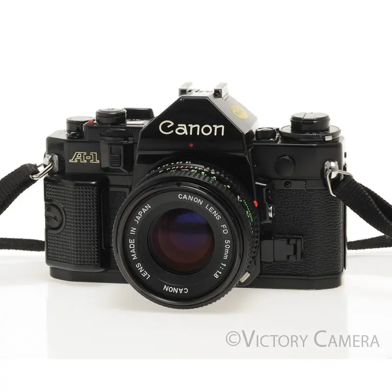 Canon A-1 A1 Black 35mm Film SLR Camera w/ 50mm f1.8 Lens -New Seals- [EXC]