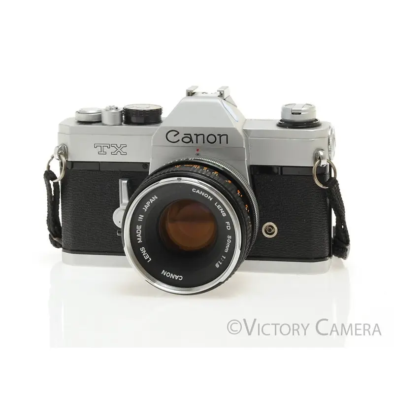 Canon TX Chrome 35mm SLR Camera w/ 50mm f1.8 Lens -New Seals- [EXC]