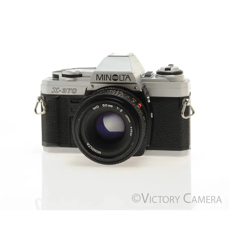 Minolta X-370 Chrome 35mm Manual Focus Camera w/ 50mm f2 Lens [EXC]