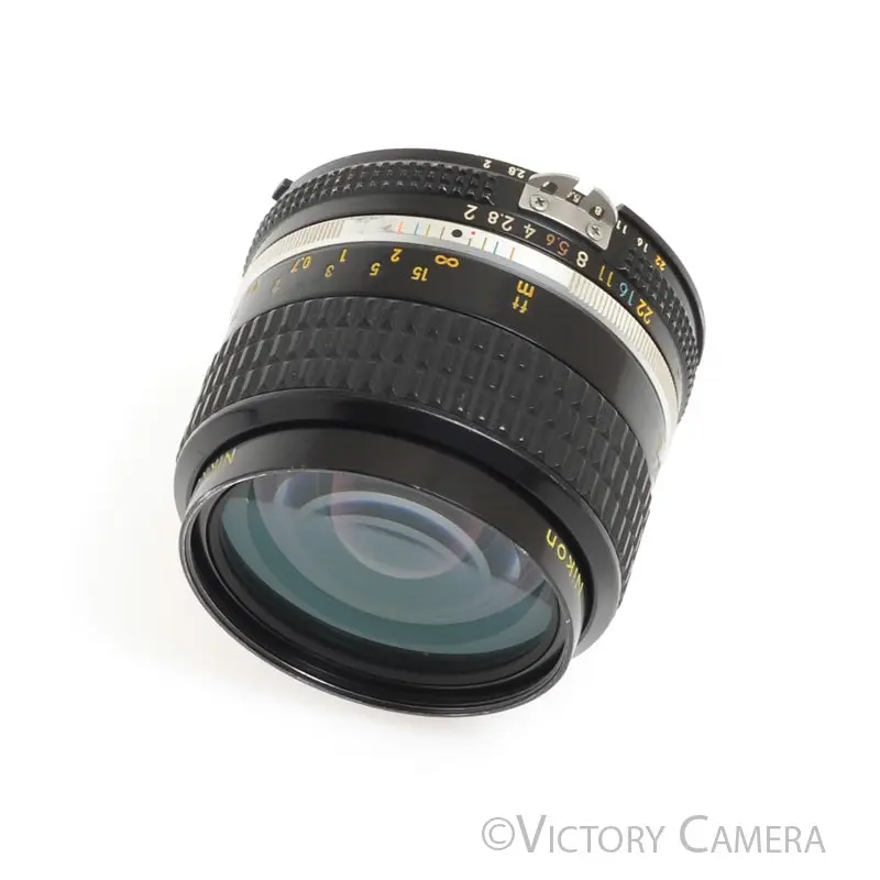 Nikon Nikkor 35mm f2.0 AI-S Fast Wide Angle Lens -Yellow Text, T.S.A- [EXC]