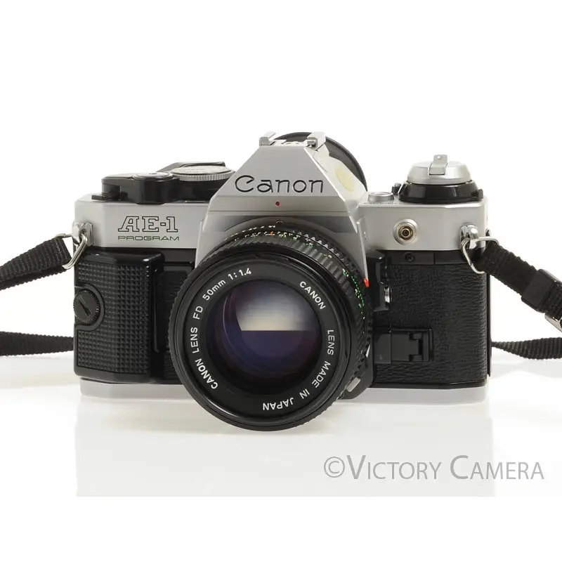 Canon AE-1 Program Chrome 35mm Film Camera w/ 50mm f1.4 Lens -New Seals- [EX+]
