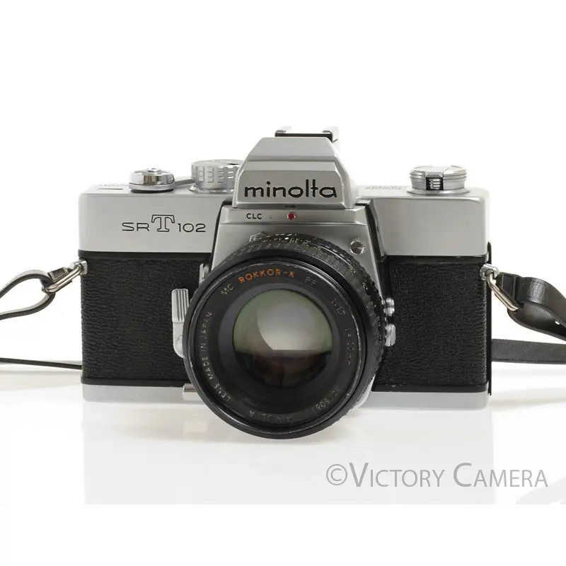 Minolta SRT102 SRT 102 Chrome 35mm Camera w/ 50mm F1.7 Lens -New Seals [EXC]